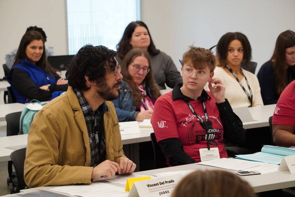 Judge during preliminary round asking a question during Q&A segment.