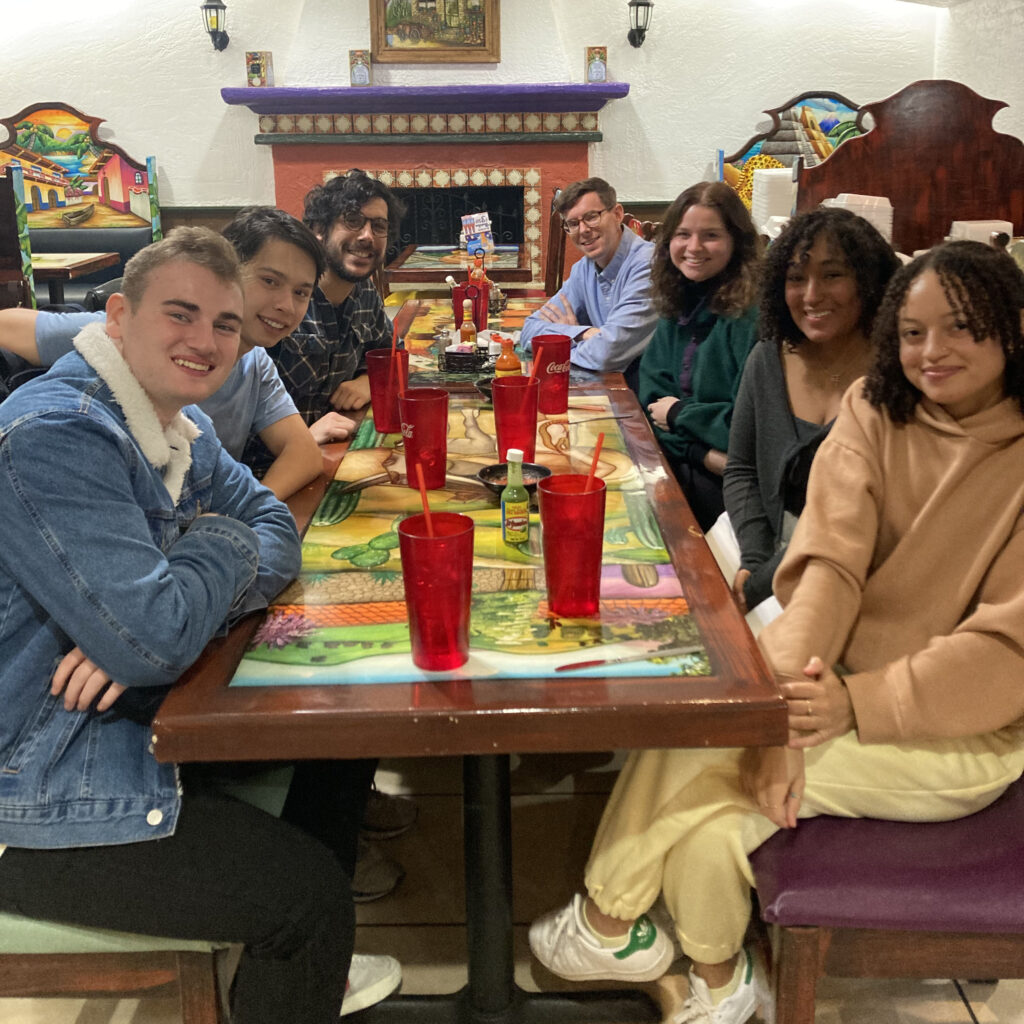 UC's IEB Ethics Bowl team enjoying a team meal before competition