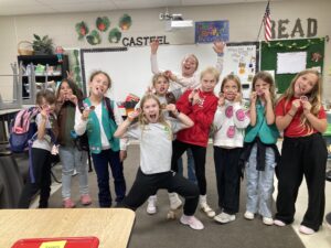 Girl Scout troop 4690 with their newly earned Give Voice to Your Values patch